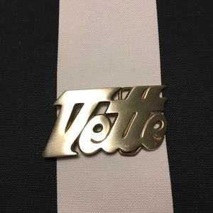 Vintage 1970’s solid brass corvette belt buckle